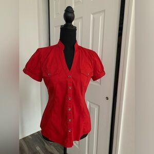 Express woman’s puff sleeve shirt in red